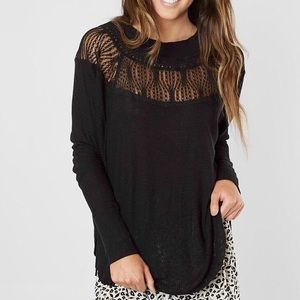 Black free people sweater with cool cut outs!